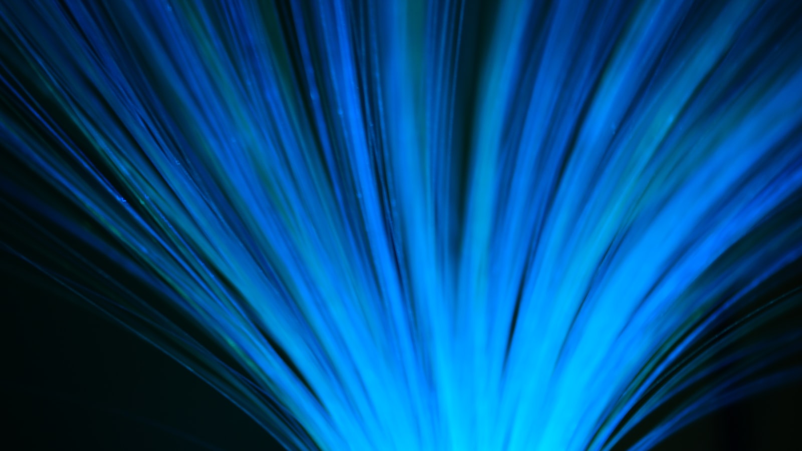 Fiber optic light radiating outward — symbolizing enterprise network connectivity